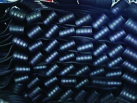 Auto stacking system for rubber strips